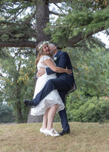 Bride and groom messing about