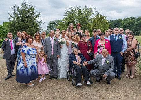 Wedding group photo in the grounds of Aston Golf Club in Hertfordshire