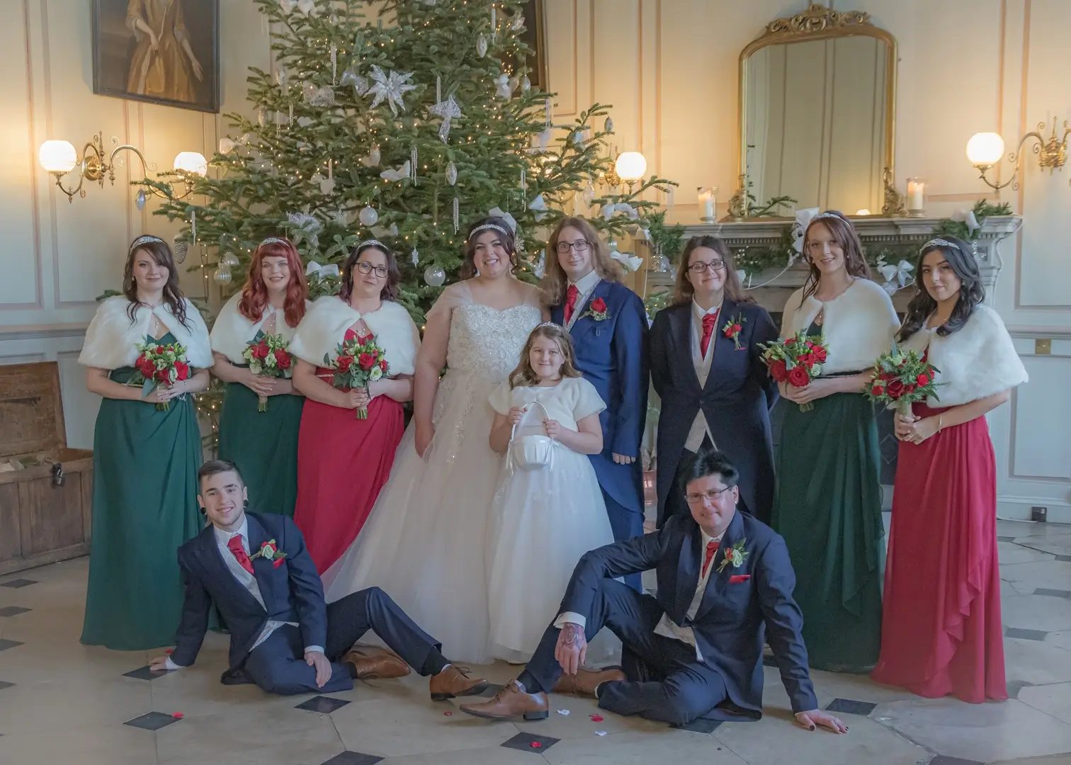 Wedding party by a Christmas Tree at Gosfield Hall