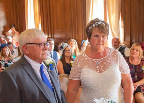 Bride an groom during their wedding ceremony at Braintree Town Hall