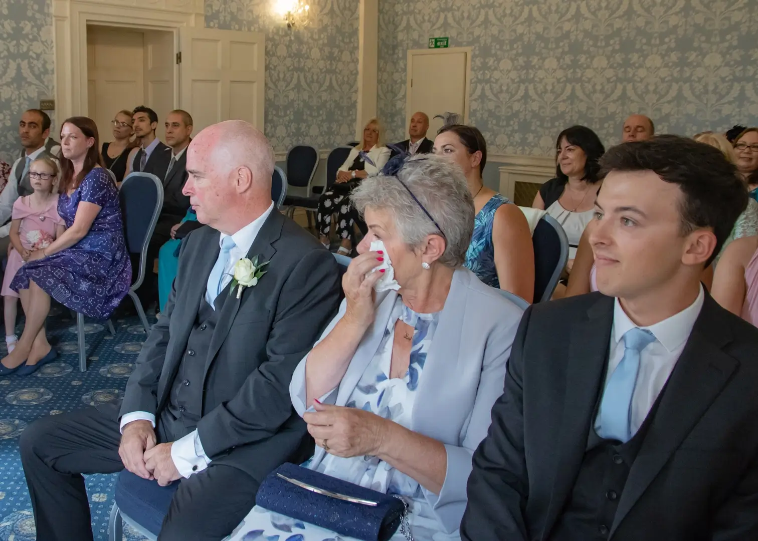 Mother of the bride needs her hankie during a wedding ceremony at Langtons House