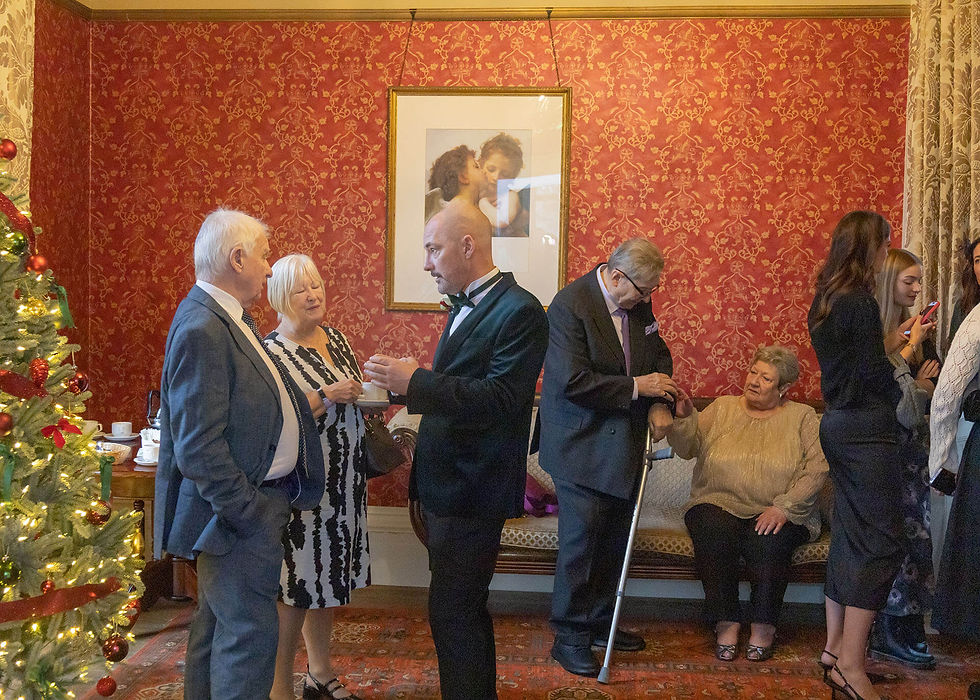 The Fennes wedding photo of guests mingling and chatting