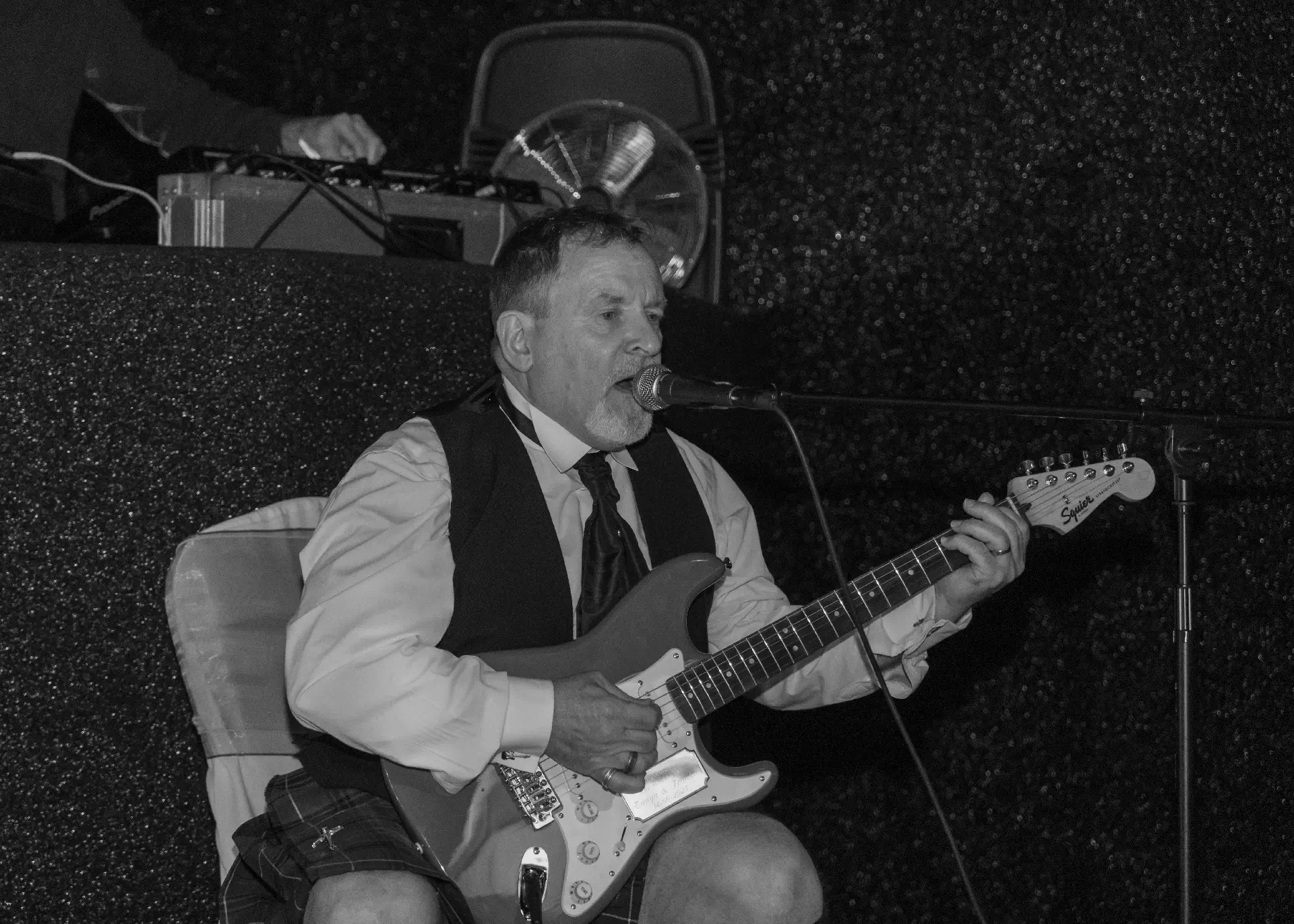 Groom serenades his bride at The Fennes
