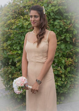 Essex Records Office wedding photo of bride in peach dress with pastel bouquet