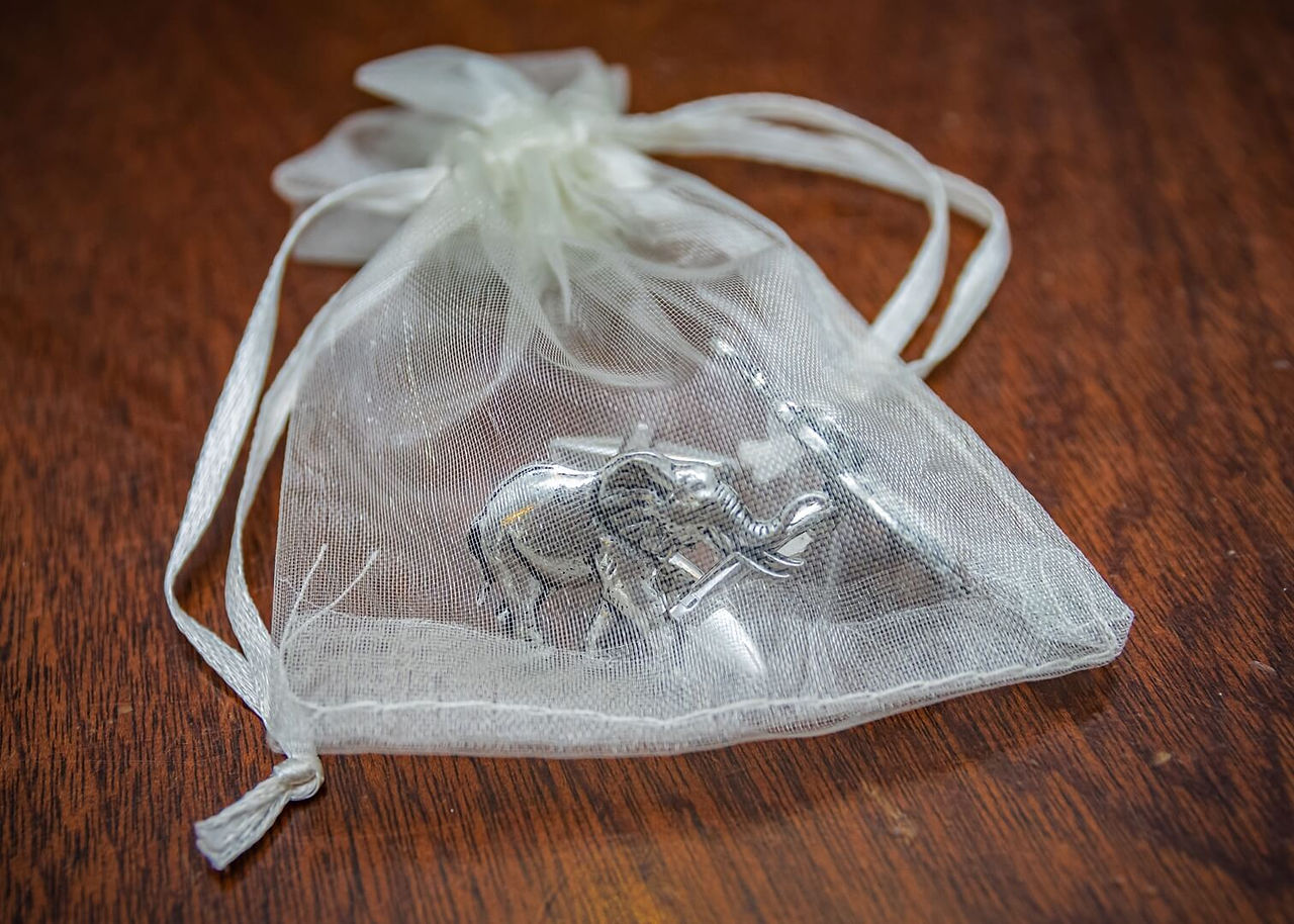 Grooms elephant cufflinks in memory of his mothers favourite animal