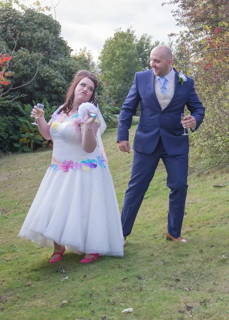 Bride and groom having fun at The Holiday Inn.Colchester