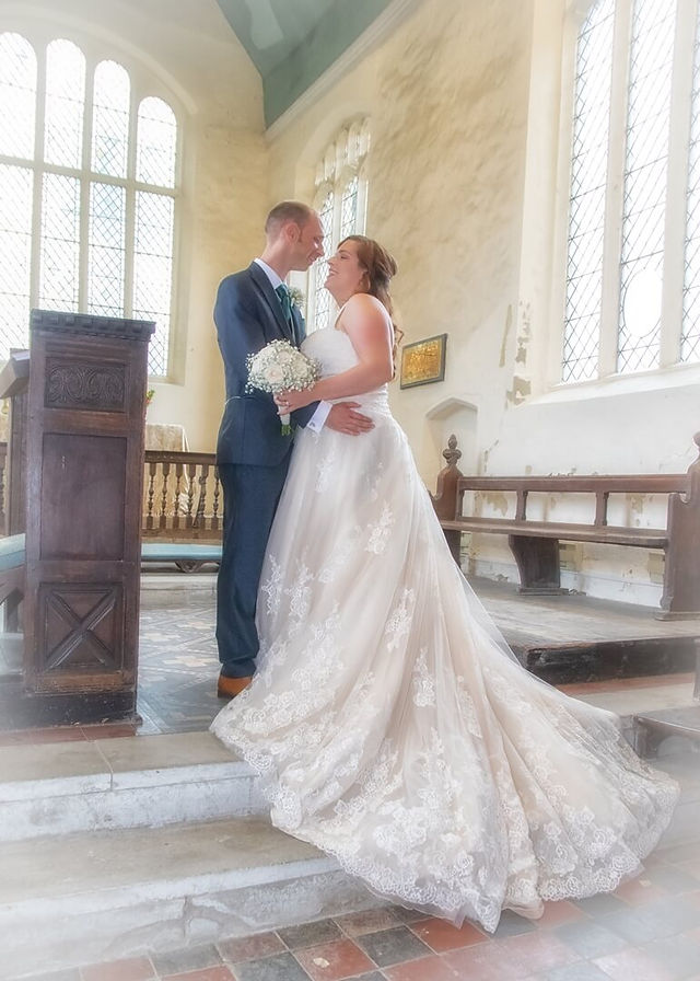 Bride and groom inside church at Great Waldingfield