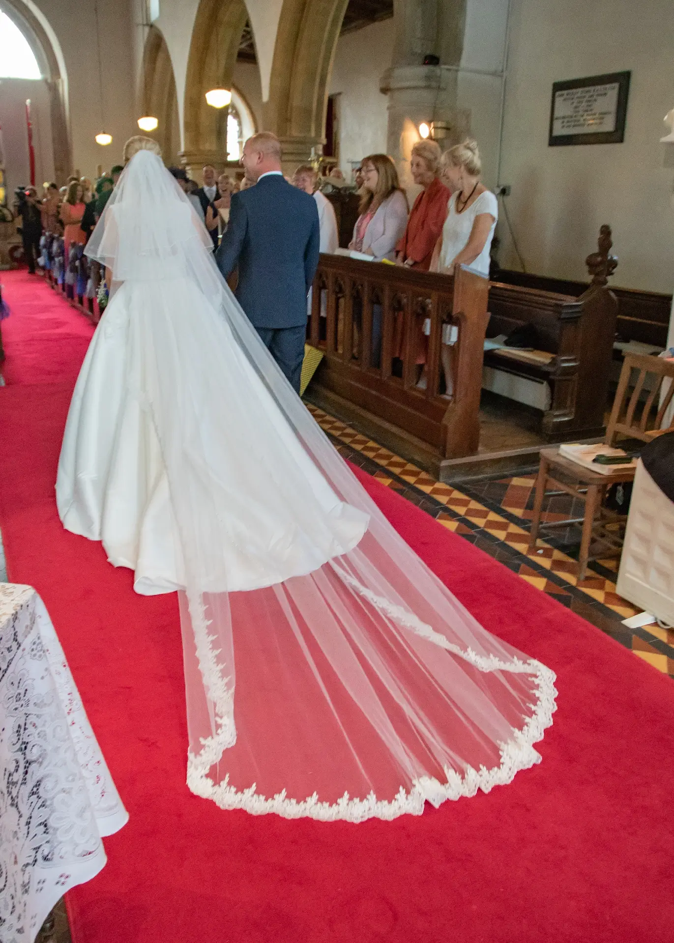Bride and groom leave Woodham Ferrers church after their ceremony