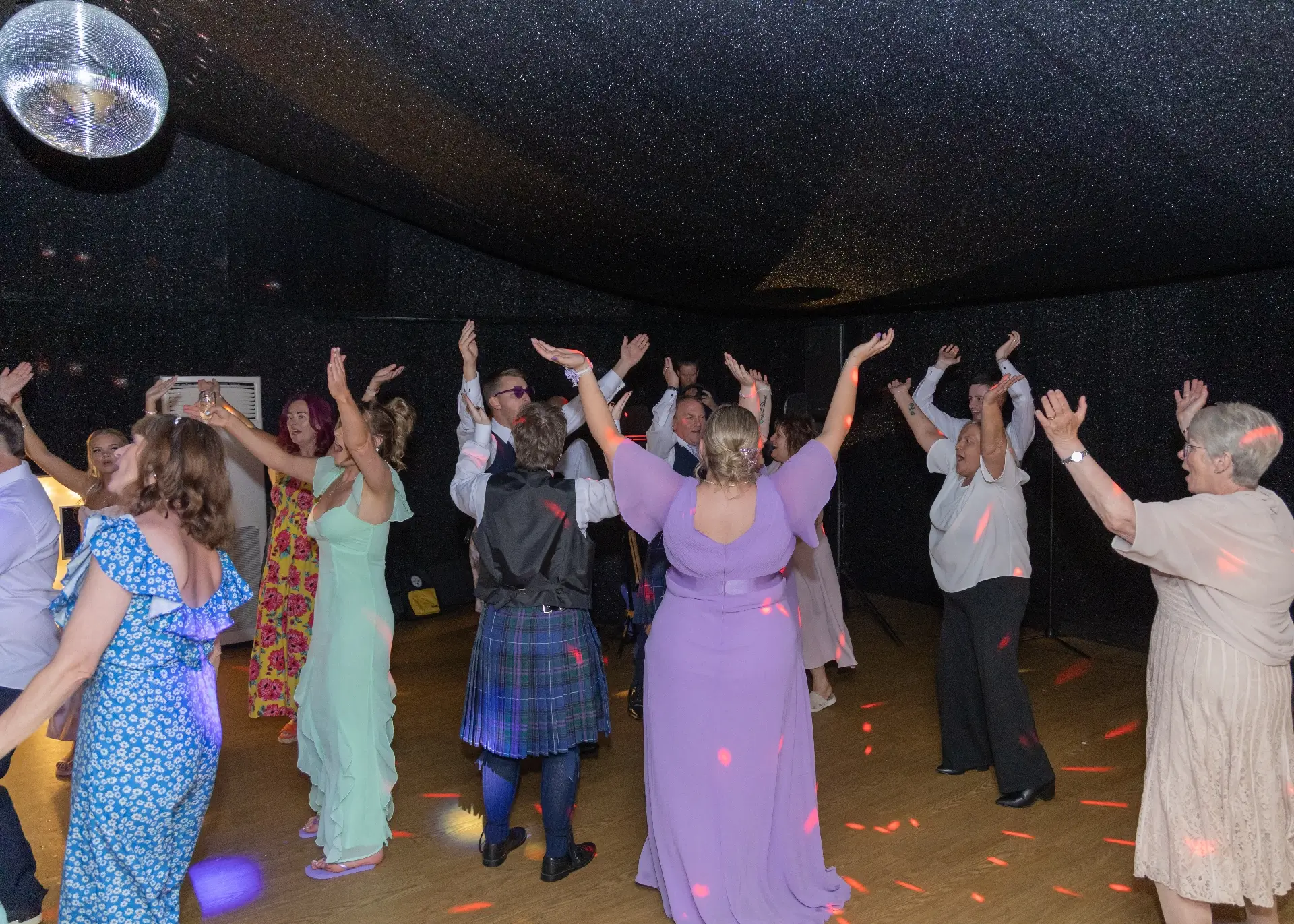 Wdding guests on the dancefloor at The Fennes