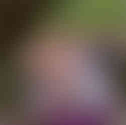 Young wedding guest in mums arms during wedding ceremony at Great Lodge