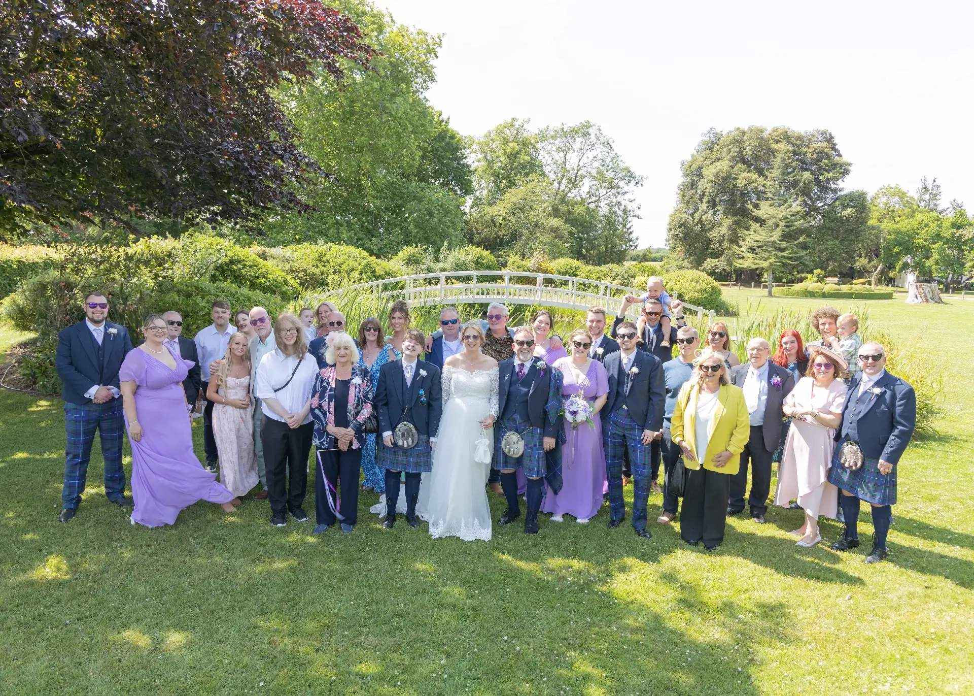Group photo by the lake at The Fennes
