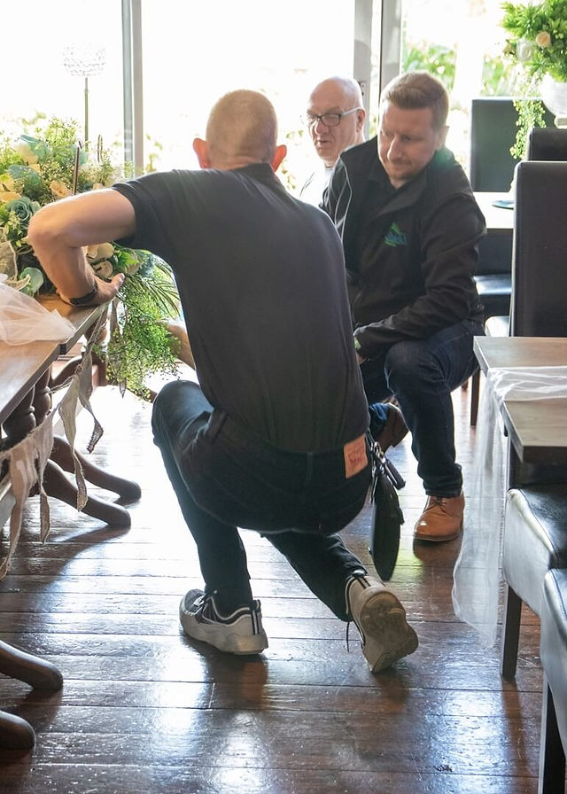 Lending a hand with the reception decorations at The Apple Tree at Gosfield Lake
