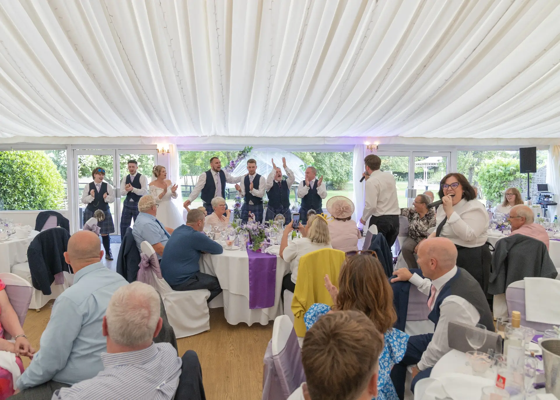 Singing waiters entertaining at a Fennes wedding reception