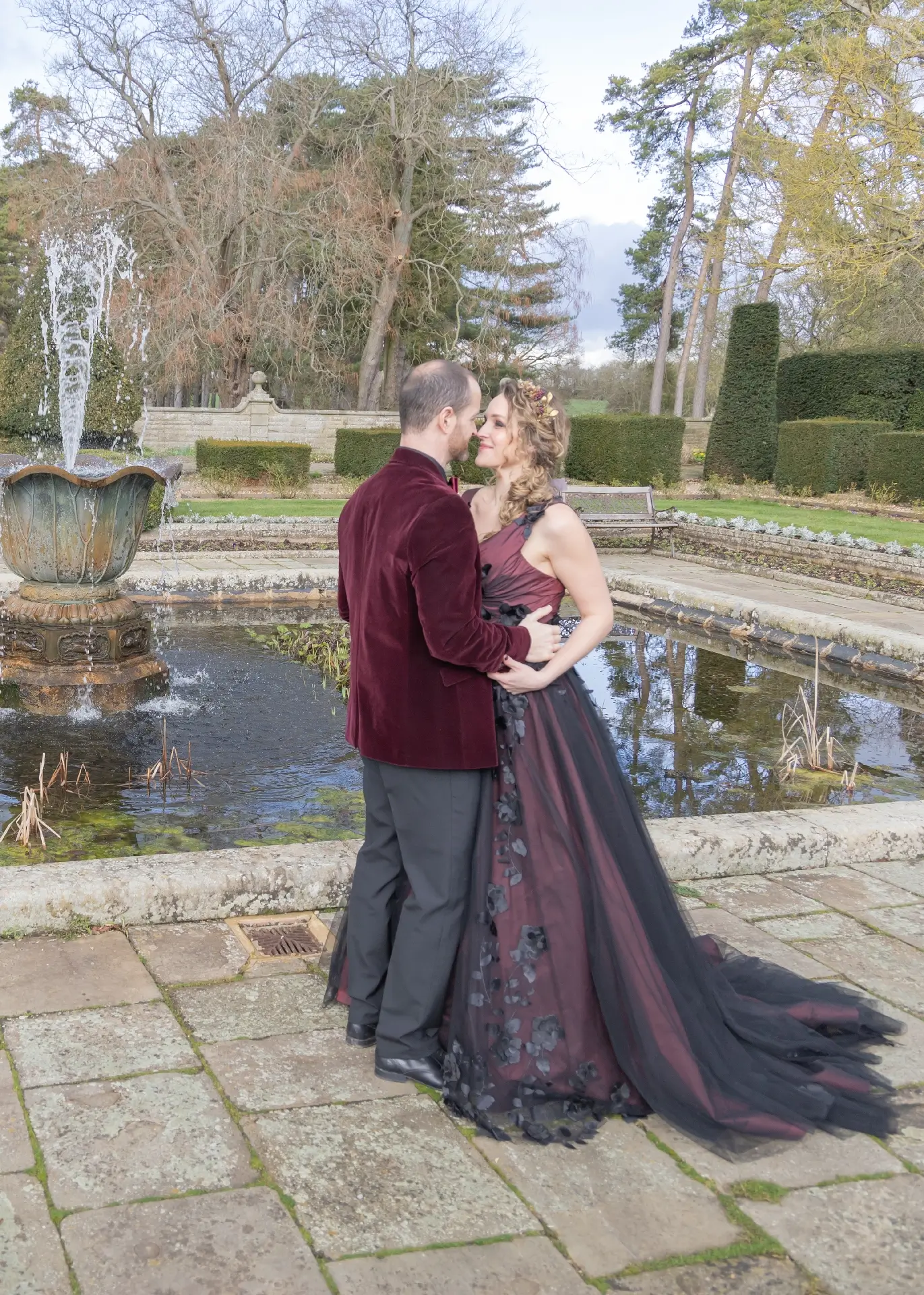 Gothic bride and groom in the grounds of Fanhams Hall
