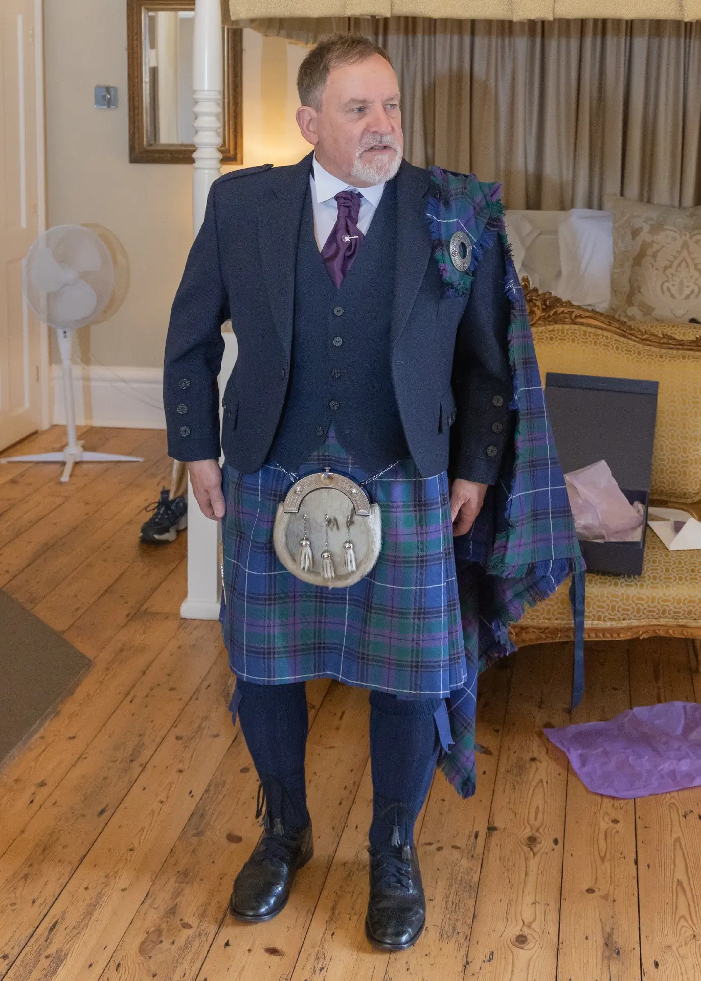 Groom in full Scottish attire at The Fennes