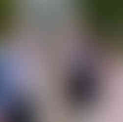 Bride and groom with his parents at Great Lodge