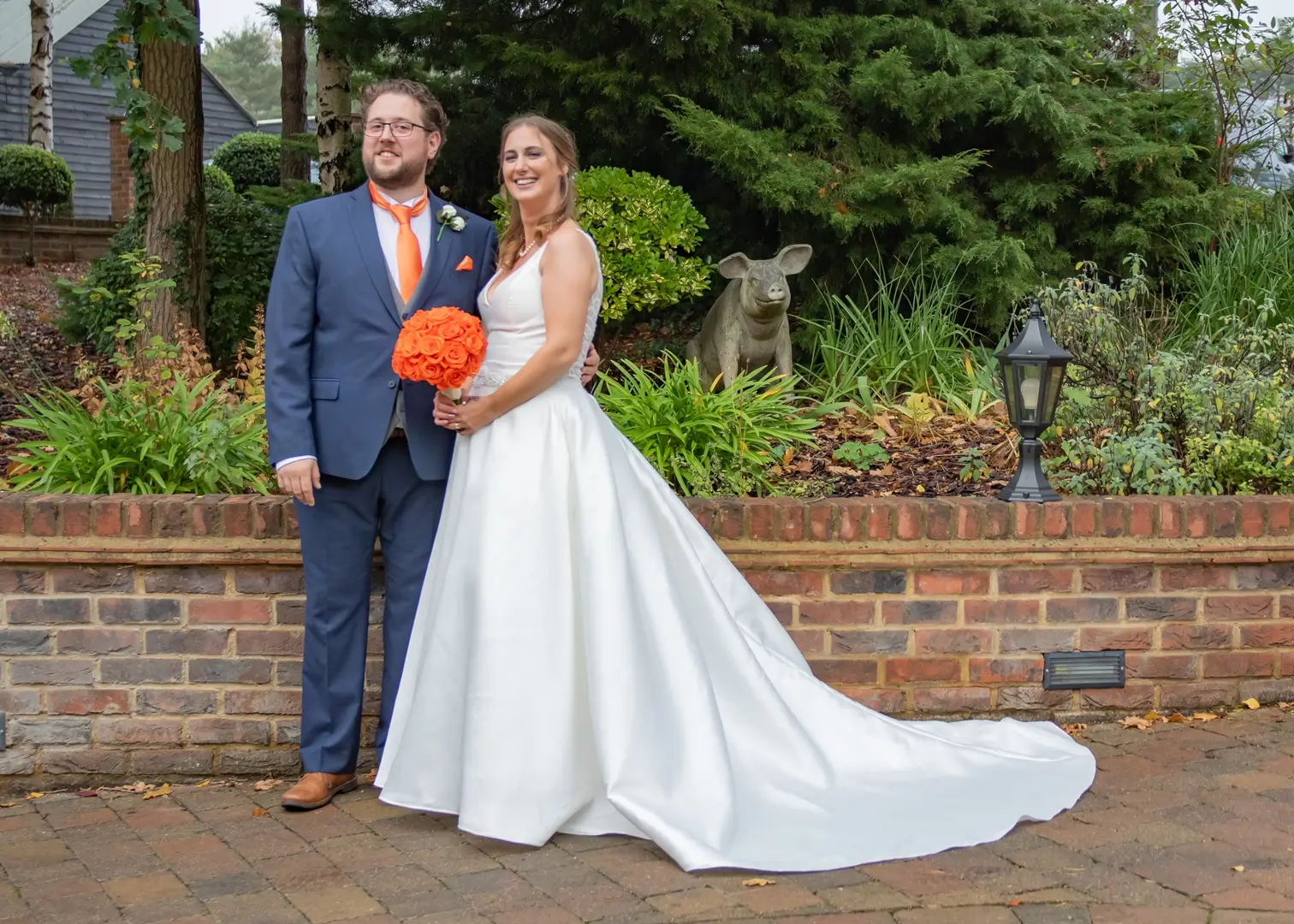 Bride and groom make the most of a break in the rain for outdoor photos