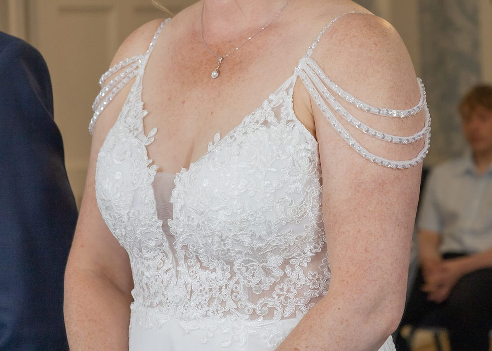 Wedding dress with beaded string shoulder details