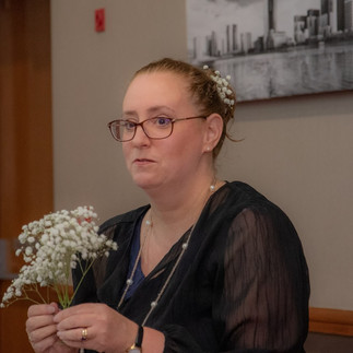 Vikki from Your Wedding Friend with a bunch of gypsophilia