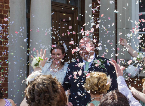Showers of confetti at a wedding in Braintree