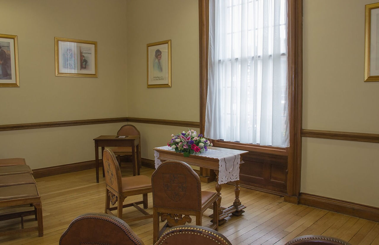 Community Room with full height windows ready for a wedding ceremony