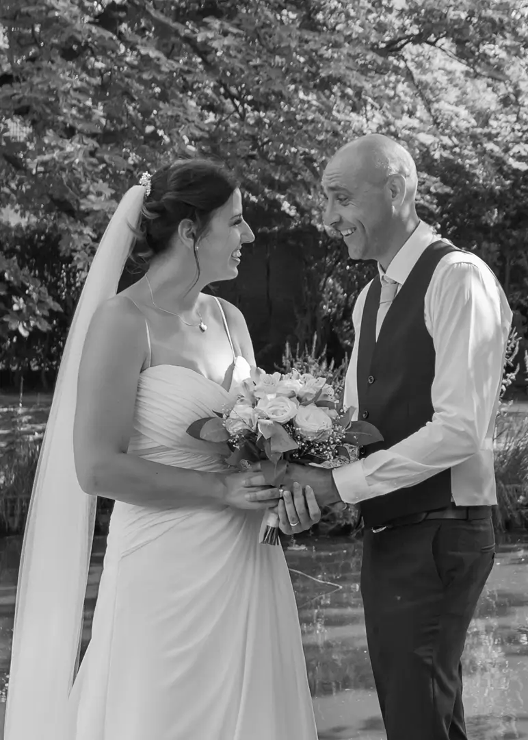 Relaxed bride and groom in the grounds of Langtons House