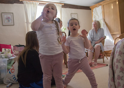 Young flower girls during preps at The Reid Rooms