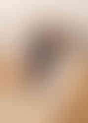 Staff member at The Fennes holds the door open for the brides entrance