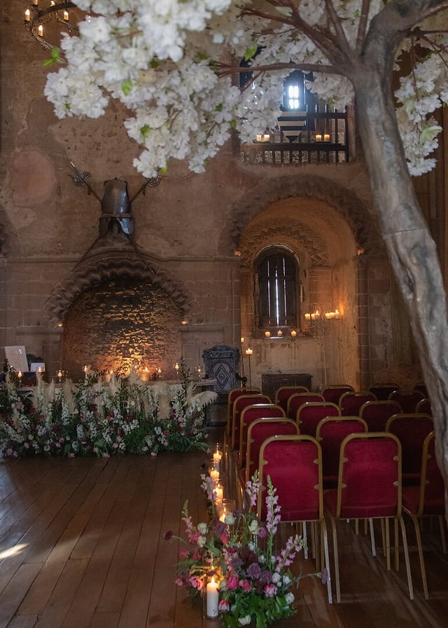 Candlelit ceremony room at Hedingham Castle