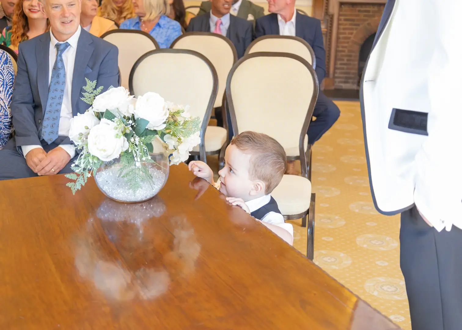 Cheeky young wedding guest at Langtons House