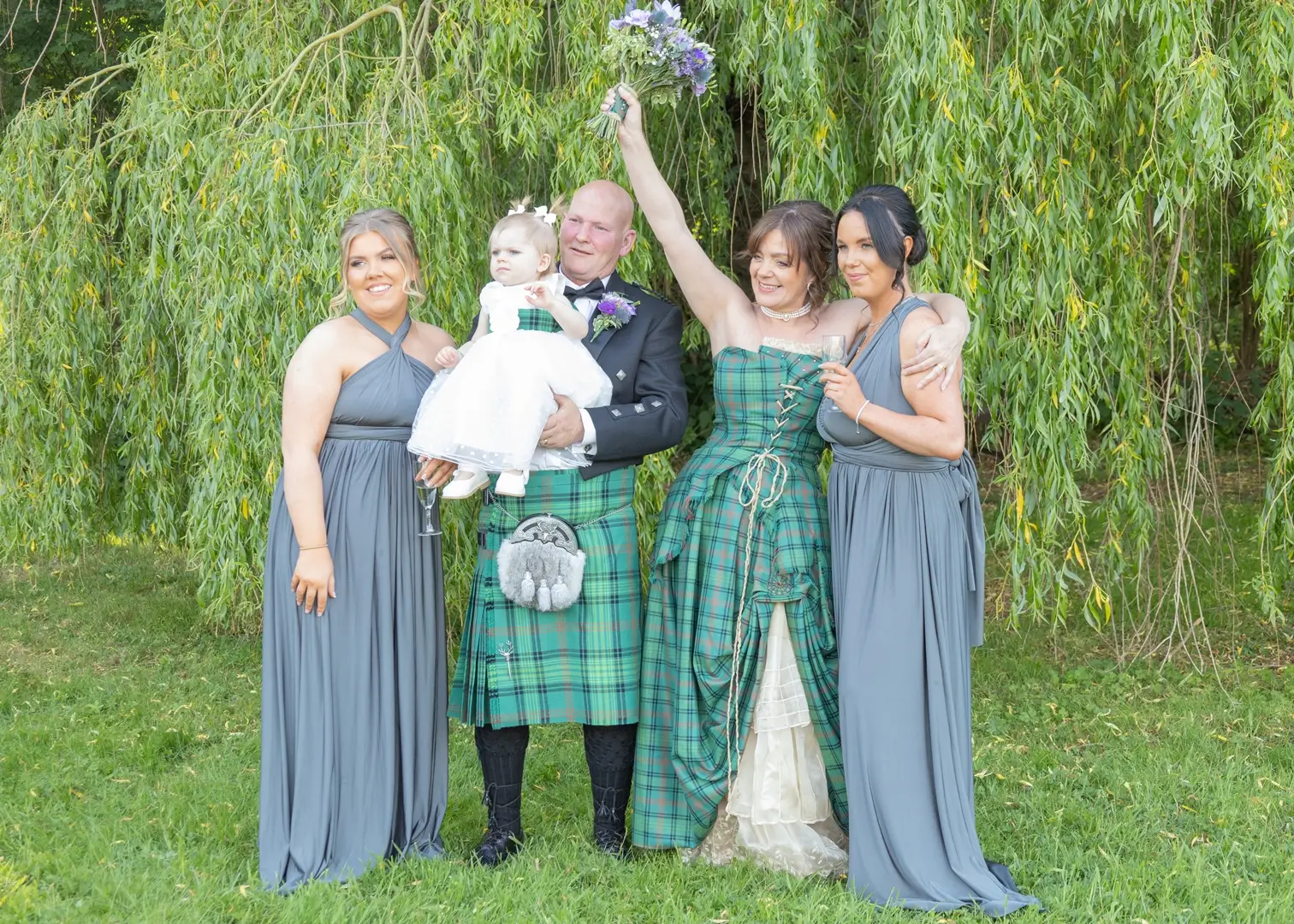 Bride and groom with their children at Prested Hall