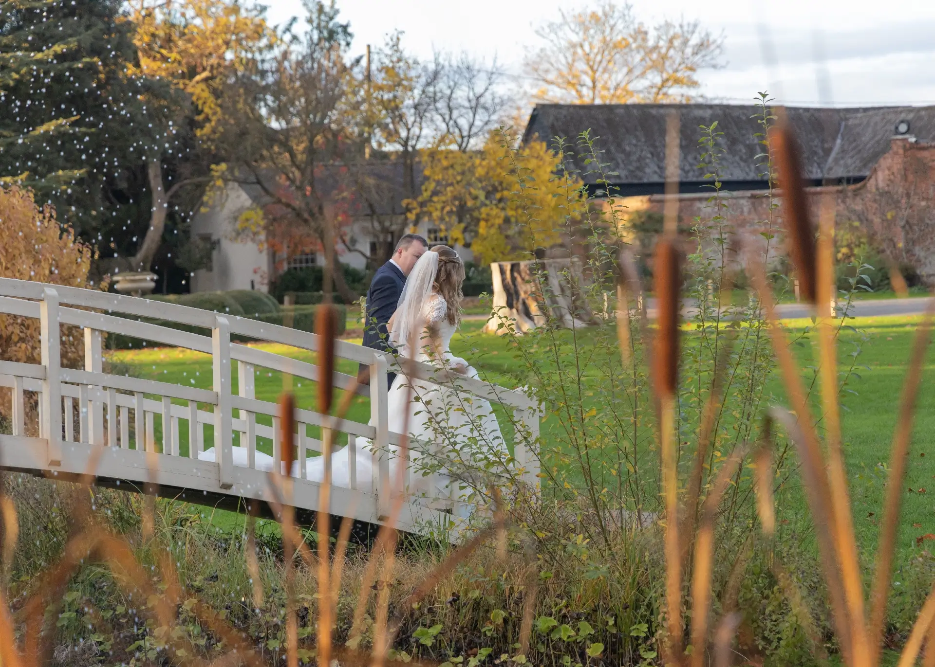 Bride and groom in the grounds of The Fennnes
