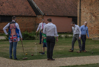 Wedding guests playing croquet at Great Lodge, Bardfield
