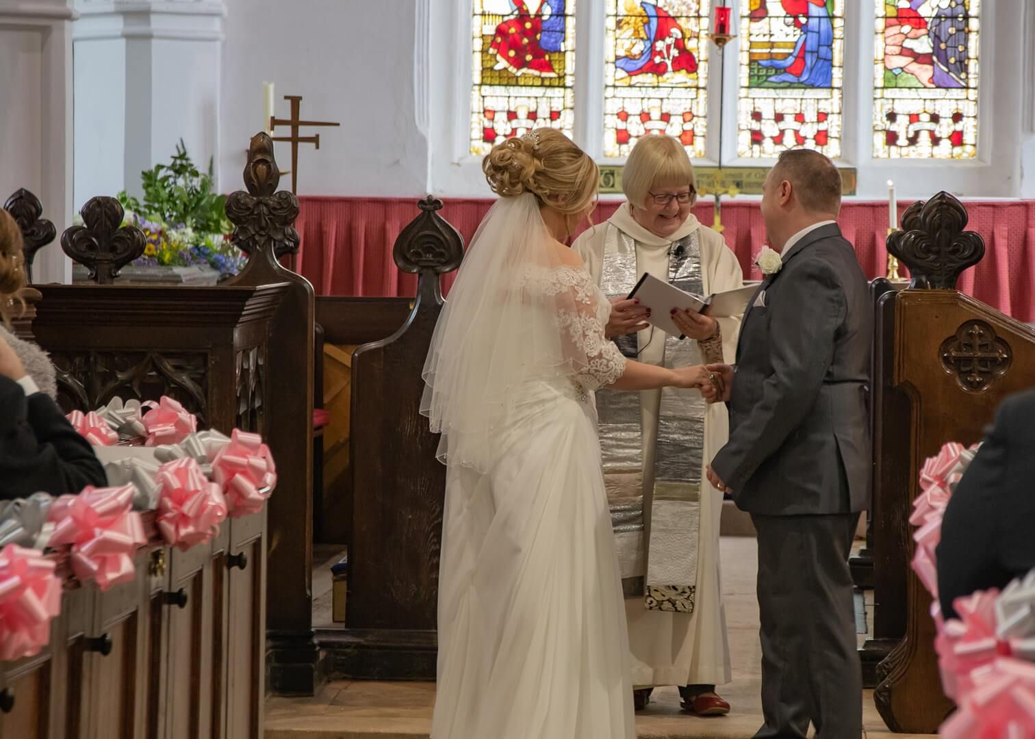 Wedding ceremony at St Catherines church, Gosfield, Essex