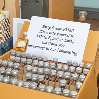 Selection of miniature bottles of rum wedding favours
