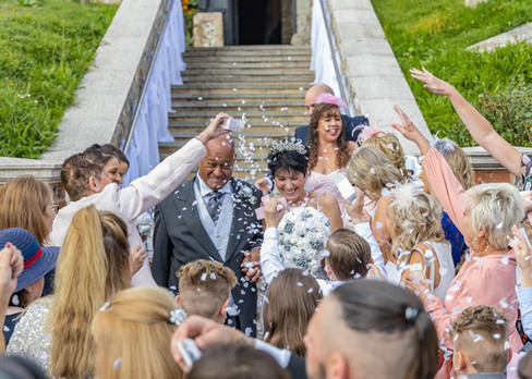 Wedding confetti shower at St Nicholas church in Laindon