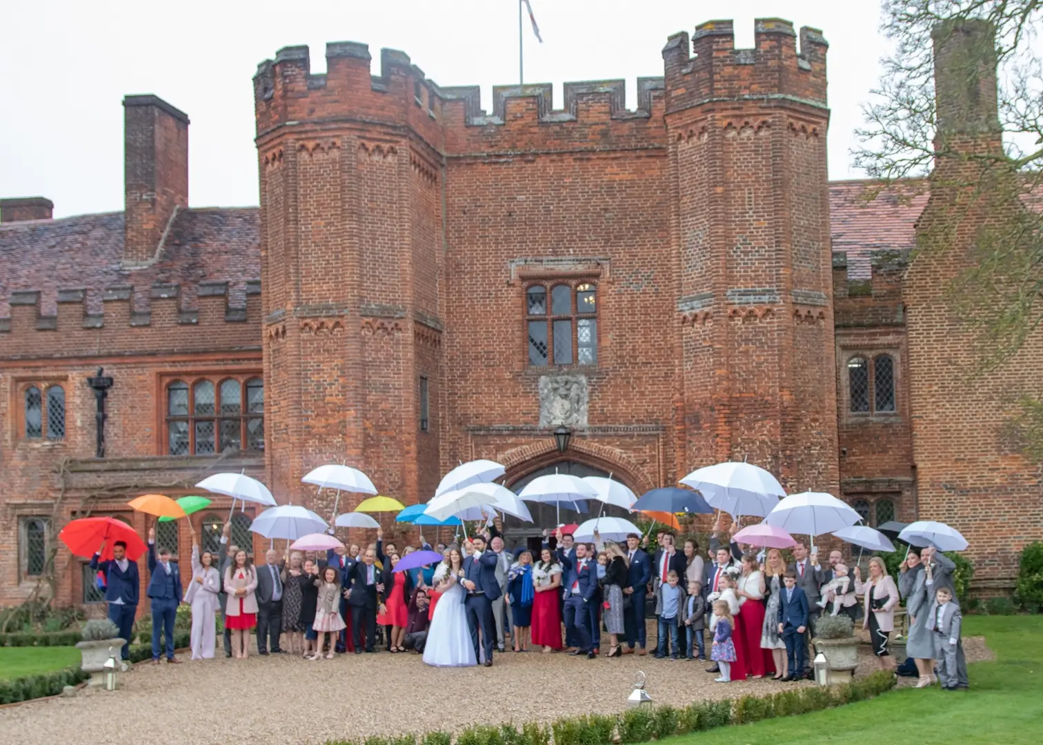 Fun with umbrellas in the rain at Leez Priory