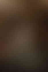 Frankincense and Myrrh candle amongst natural Christmas decorations