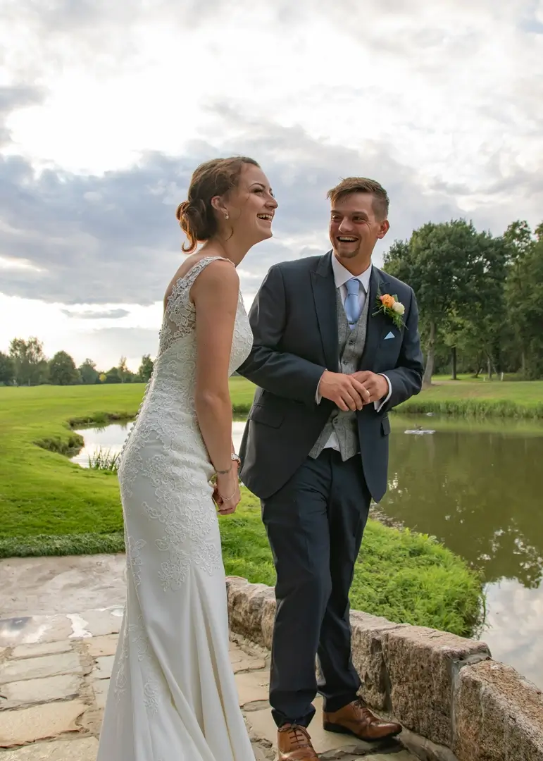 Relaxed bride and groom at Gosfield Lakes Golf Club