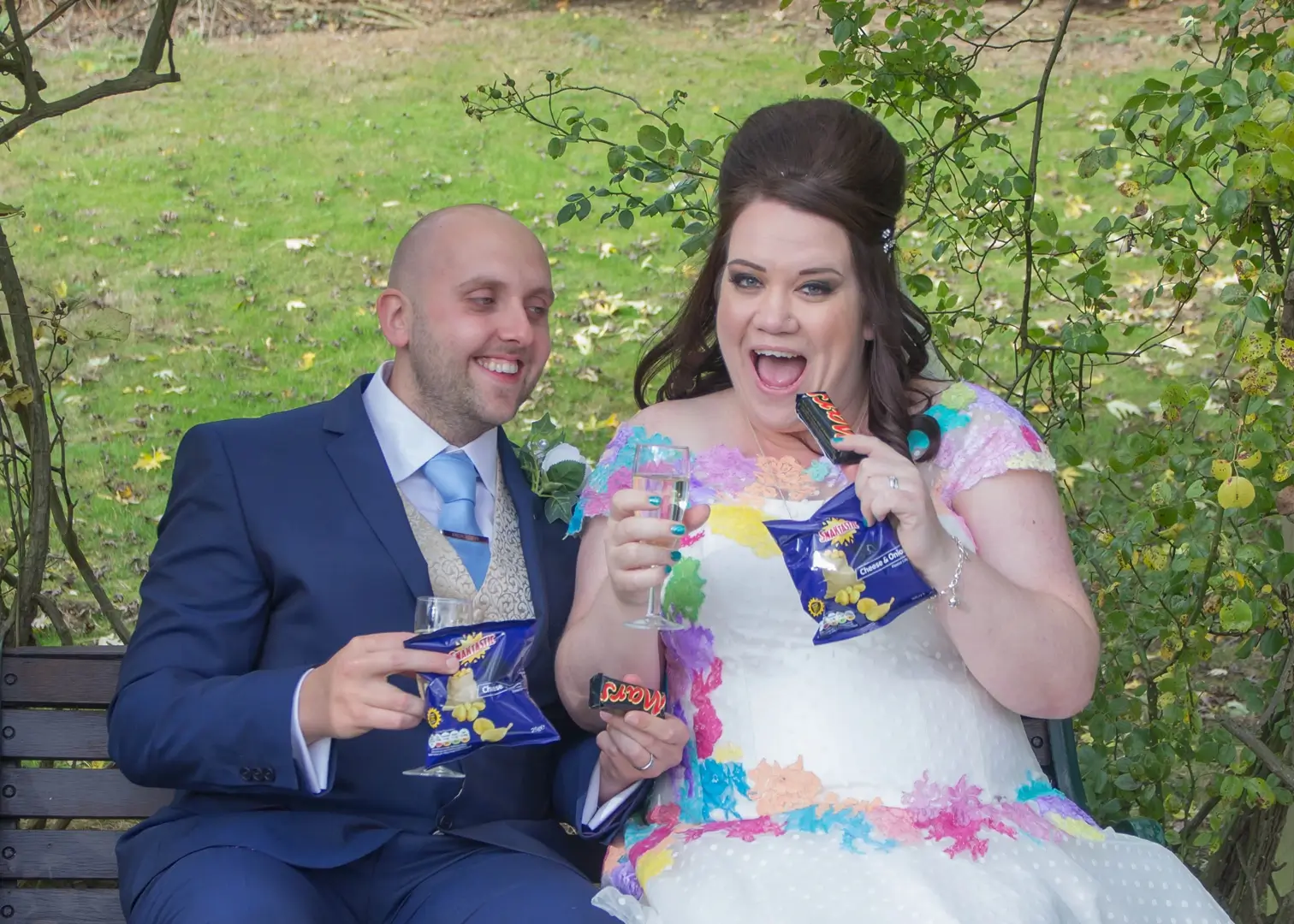 Bride and groom having fun with snacks at Holiday Inn, Colchester