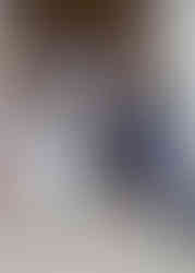 Bride and groom are showered in dried flower petals on the steps of Braintree Town Hall