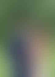 Bride and groom laugh together during their private photo session