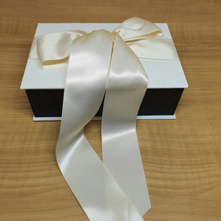 Black box with white lid and satin ribbon decoration