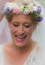 Bride in soft pastel summer flower crown