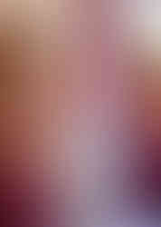 Bridesmaids in burgundy dresses lace up the back of the brides dress