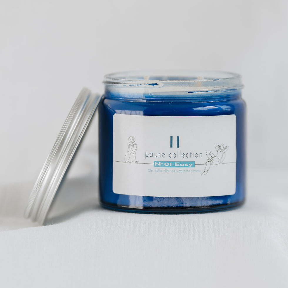 Pause Collection white soy wax candle in scent number 1 easy product image, with open lid on the left