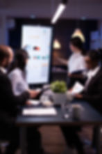 diverse-multi-ethnic-business-teamwork-overworking-office-meeting-room-analyzing-financial
