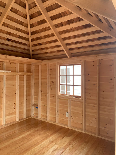 Custom-designed, beautiful tool shed, delivered fully built, providing organized and accessible storage for gardening and workshop tools