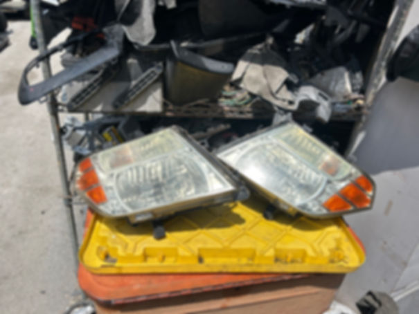 2005-2012 Nissan Pathfinder left driver headlight $120 right passenger headlight