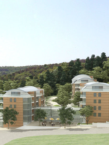 Residential buildings complex  on a tree-covered hillside
